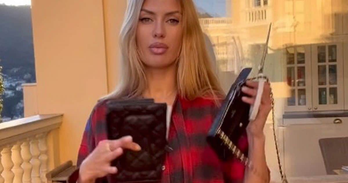 1 Furious Russian women CUT UP their Chanel handbags in protest after the fashion giants BANNED them f e1649431972143